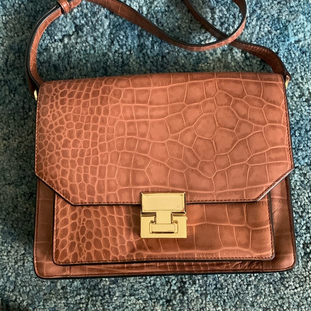 Ivanka Trump purse with pockets. Very clean. Comes with strap.
